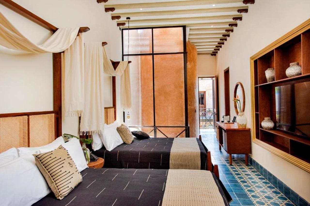 Cigno Hotel Merida Bagian luar foto